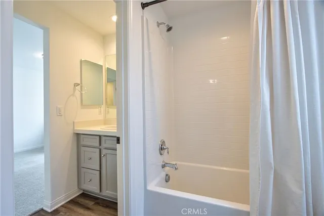 a view of a house with backyard and porch