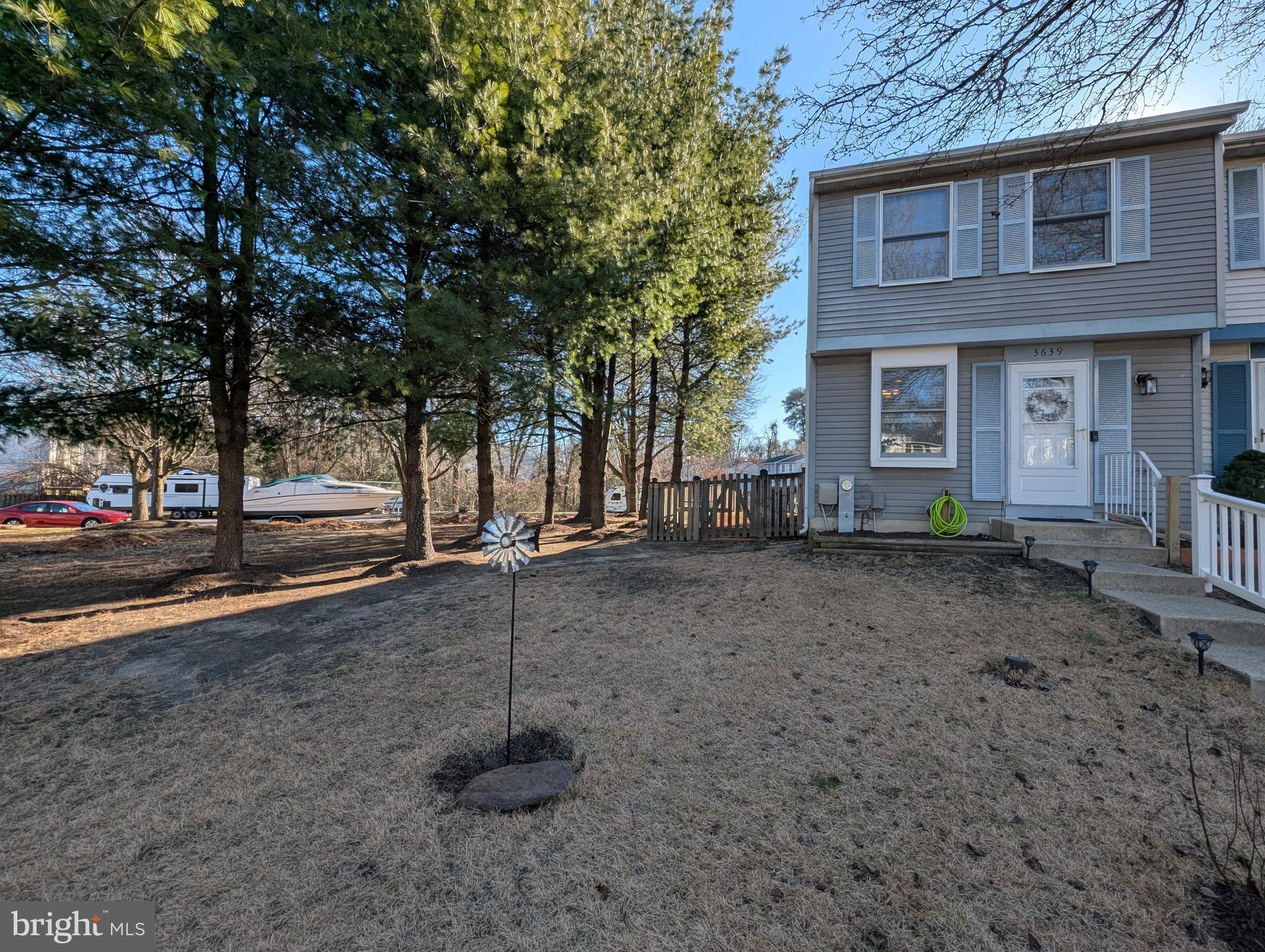 a view of a house with a street