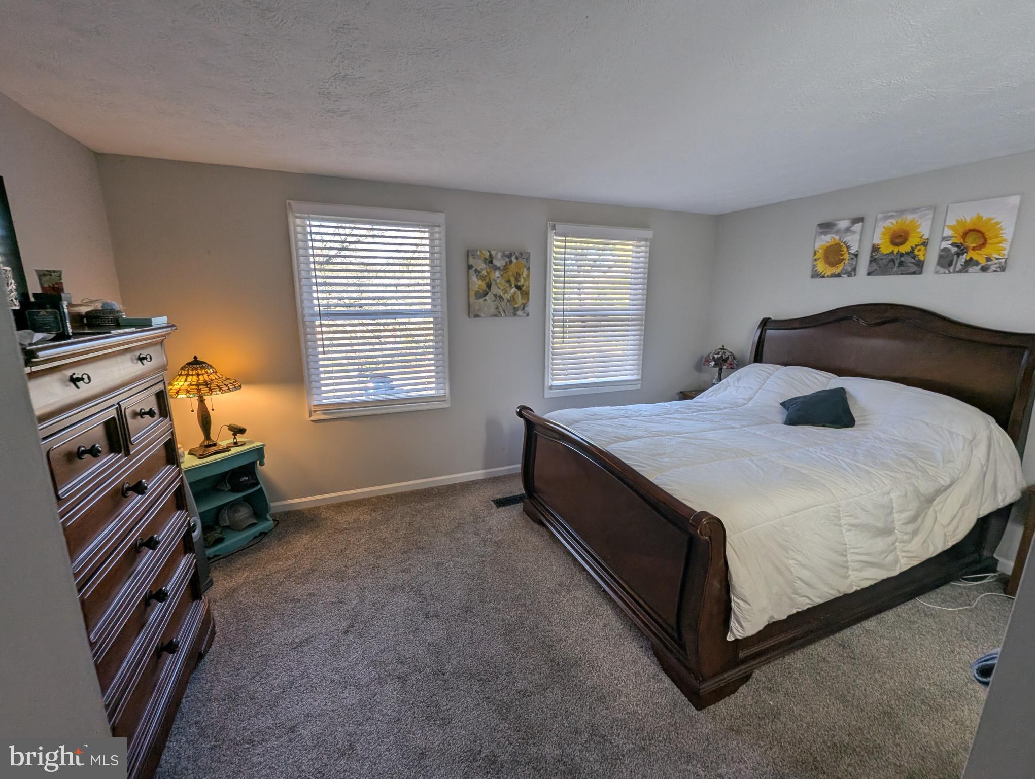 3639 Handel Court, Unit 75 Pasadena, MD 21122 - Photo 18 of 24 a bedroom with a bed and a window