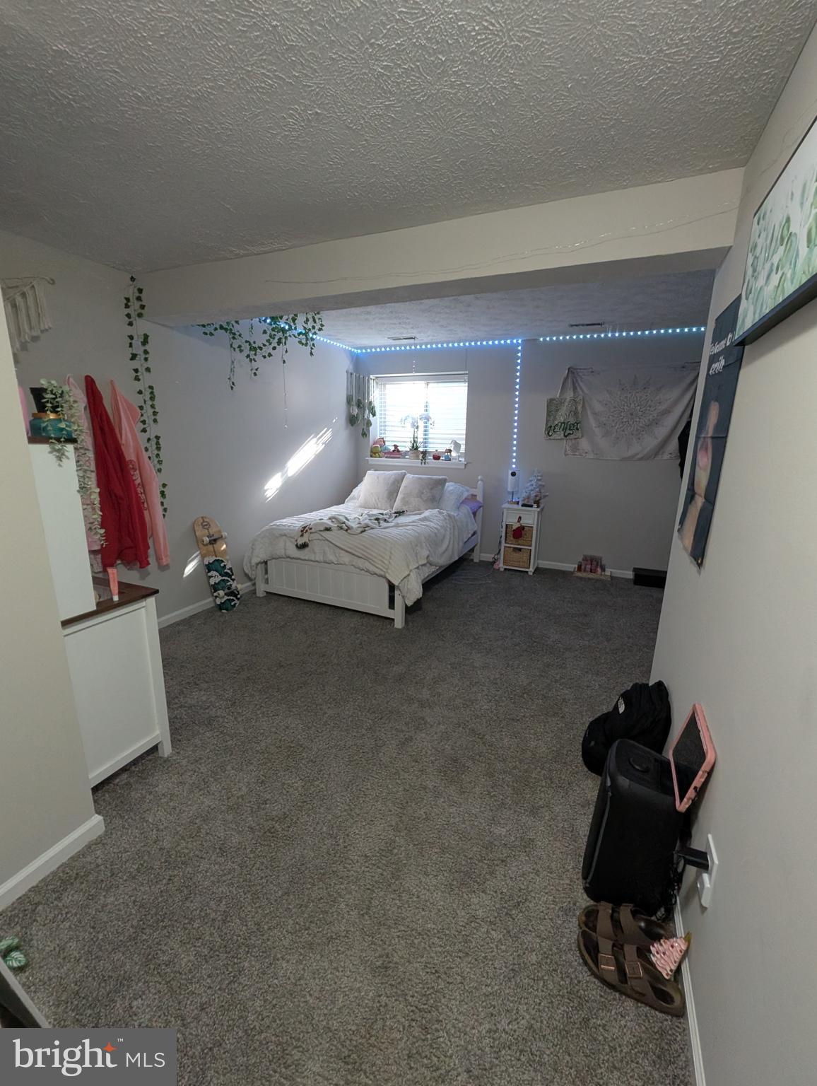 3639 Handel Court, Unit 75 Pasadena, MD 21122 - Photo 8 of 24 a living room with furniture and a rug