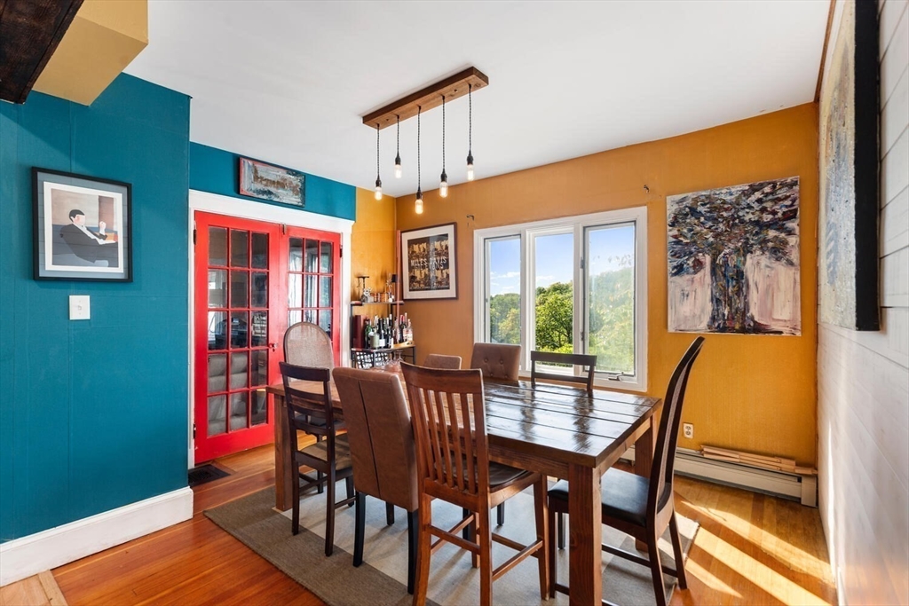 28 Gordon Road Medford, MA 02155 - Photo 14 of 41 a view of a dining room with furniture window and wooden floor