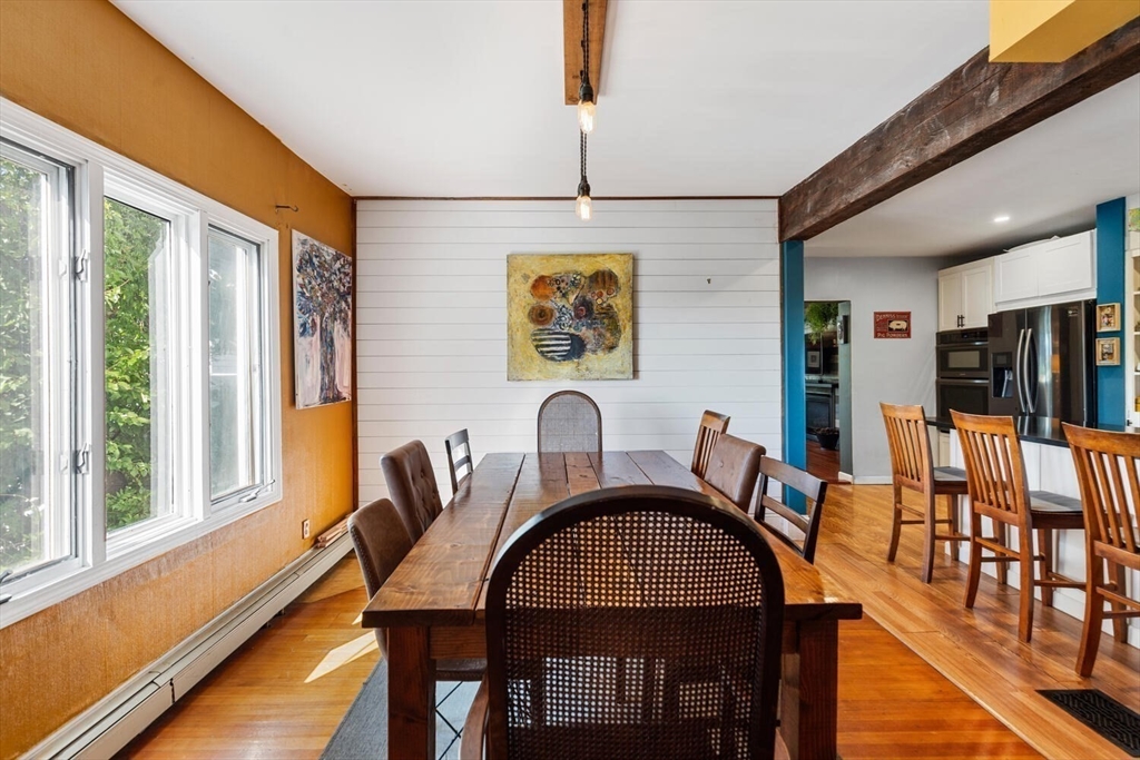 28 Gordon Road Medford, MA 02155 - Photo 16 of 41 a view of a dining room with furniture window and outside view