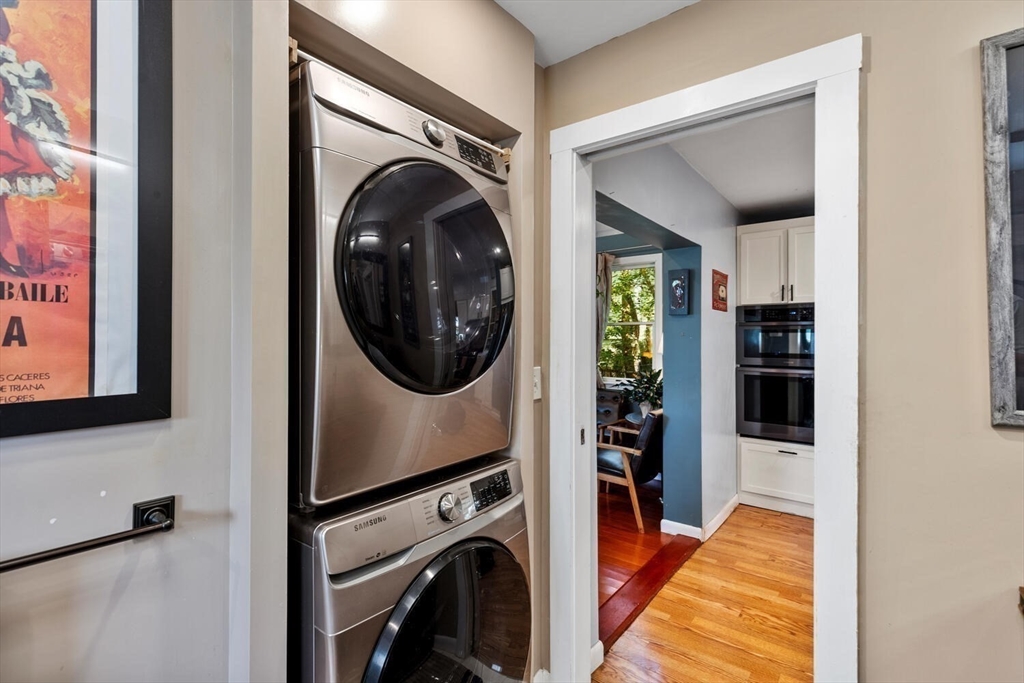 28 Gordon Road Medford, MA 02155 - Photo 22 of 41 a view of a hallway with washer and dryer