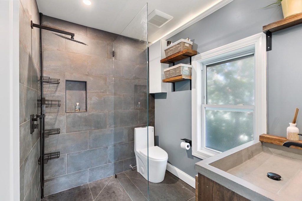 28 Gordon Road Medford, MA 02155 - Photo 28 of 41 a bathroom with a sink toilet and shower