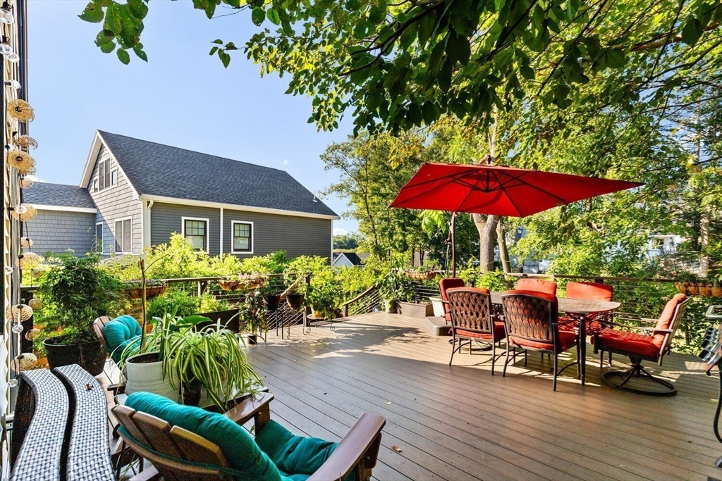 28 Gordon Road Medford, MA 02155 - Photo 32 of 41 a view of a patio with chairs and potted plants