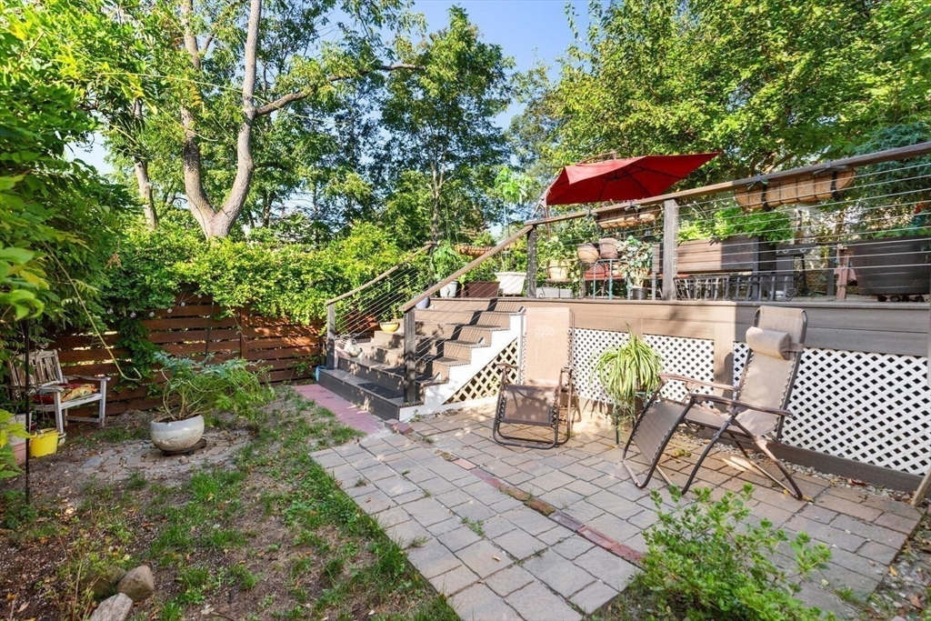 28 Gordon Road Medford, MA 02155 - Photo 38 of 41 a view of a patio with chairs and table