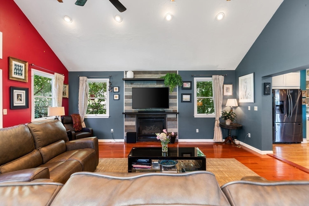 28 Gordon Road Medford, MA 02155 - Photo 10 of 41 a living room with furniture flat screen tv and a large window