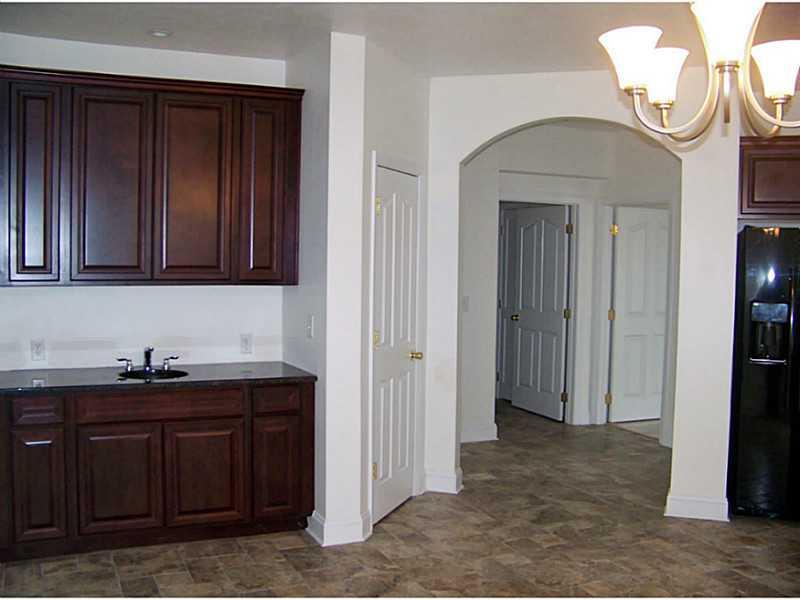 216 Adams Pointe Boulevard, Unit 10 Mars, PA 16046 - Photo 4 of 17 Dining Room. Wet bar area