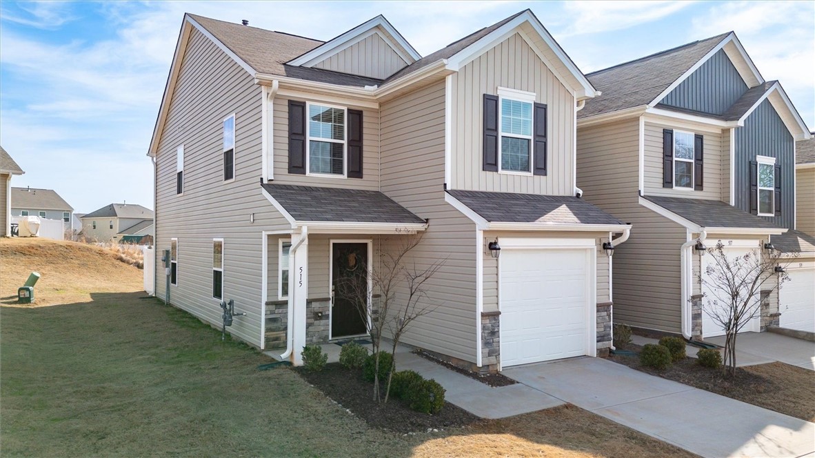 This end-unit property offers an oversized yard and additional side windows, creating an abundance of natural light throughout the home.
