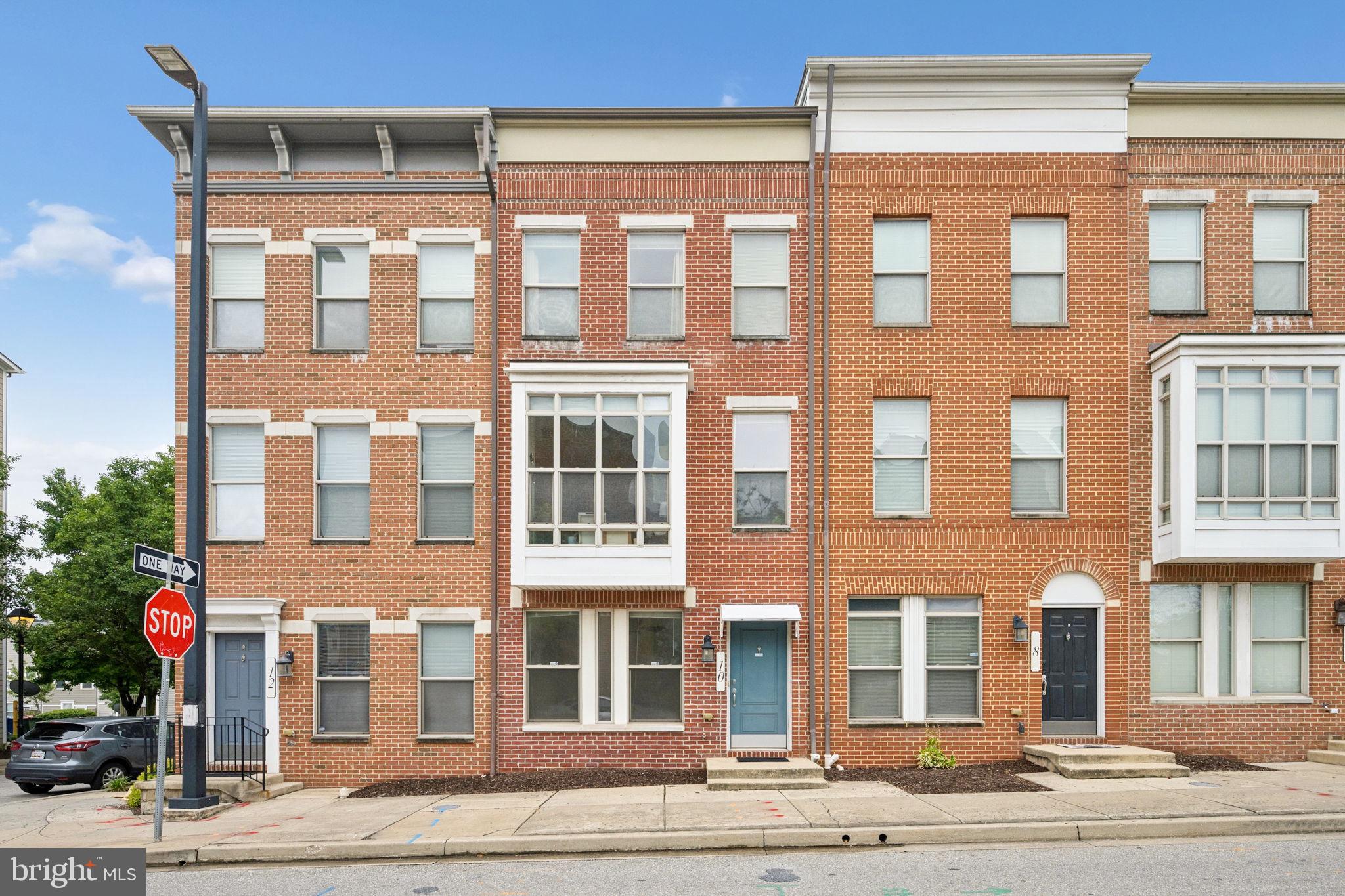 10 South Exeter Street Baltimore, MD 21202 - Photo 2 of 55 Charming brick townhomes in a row.