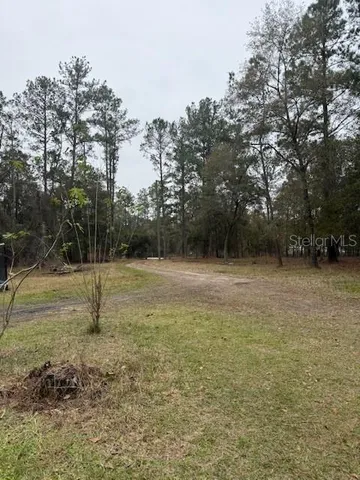 a view of outdoor space with swimming pool