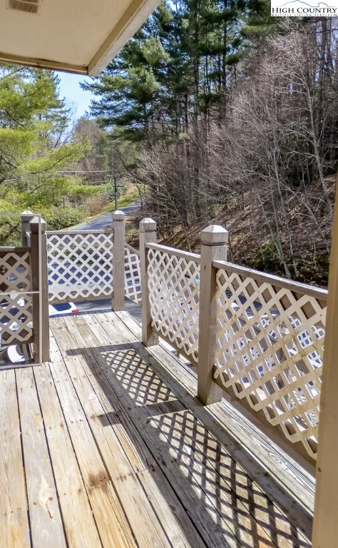 200 Pilgrims Way, Unit 25 Boone, NC 28607 - Photo 11 of 12 a view of a wooden roof with city view