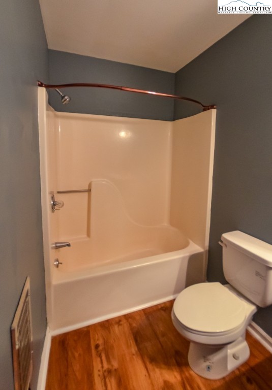 200 Pilgrims Way, Unit 25 Boone, NC 28607 - Photo 8 of 12 a bathroom with a toilet and a bathtub
