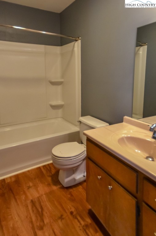 200 Pilgrims Way, Unit 25 Boone, NC 28607 - Photo 10 of 12 a bathroom with a toilet a sink and bathtub