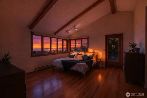 a bed room with furniture and a window