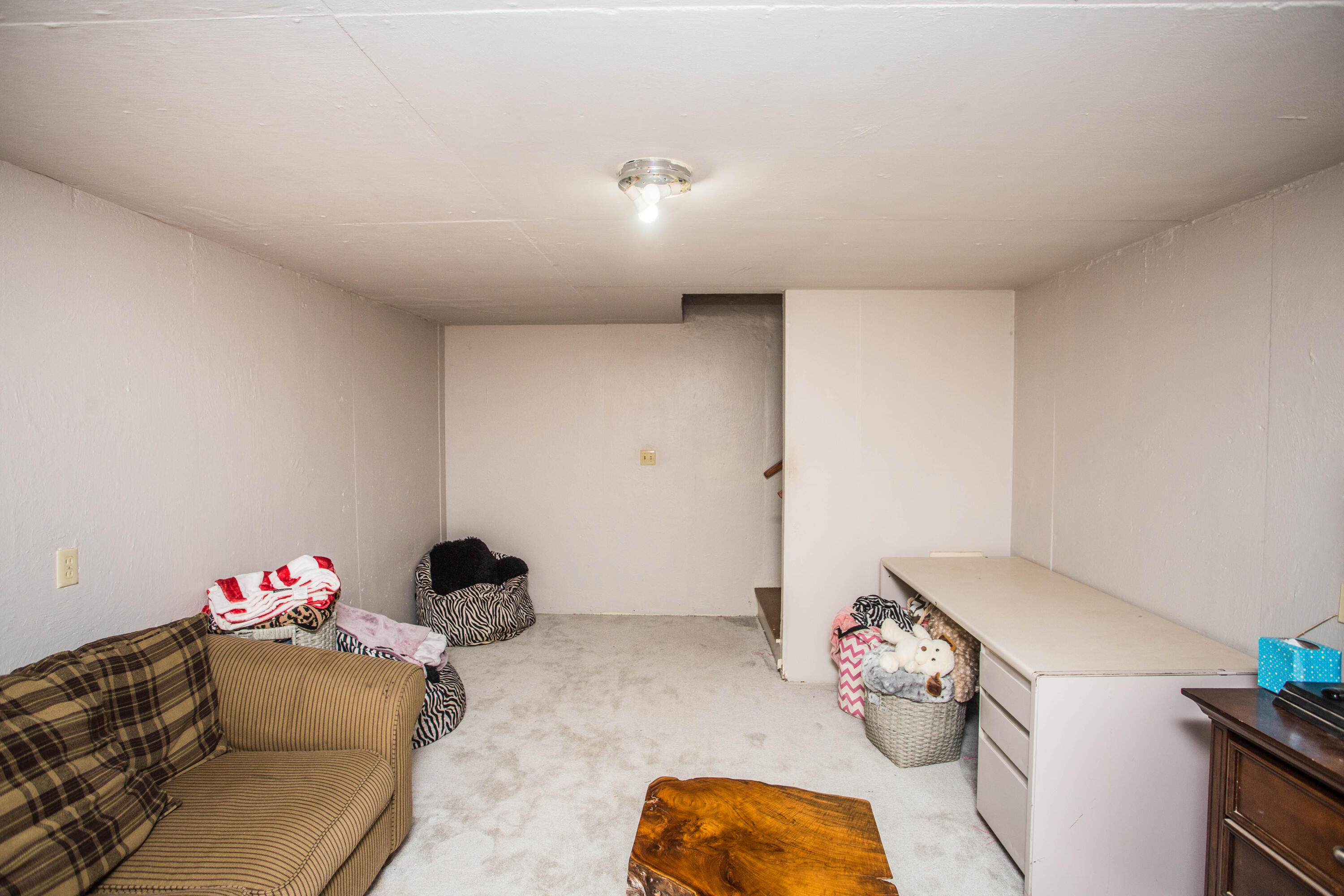 812 1st Street Abernathy, TX 79311 - Photo 23 of 53 a living room with furniture and a wooden floor