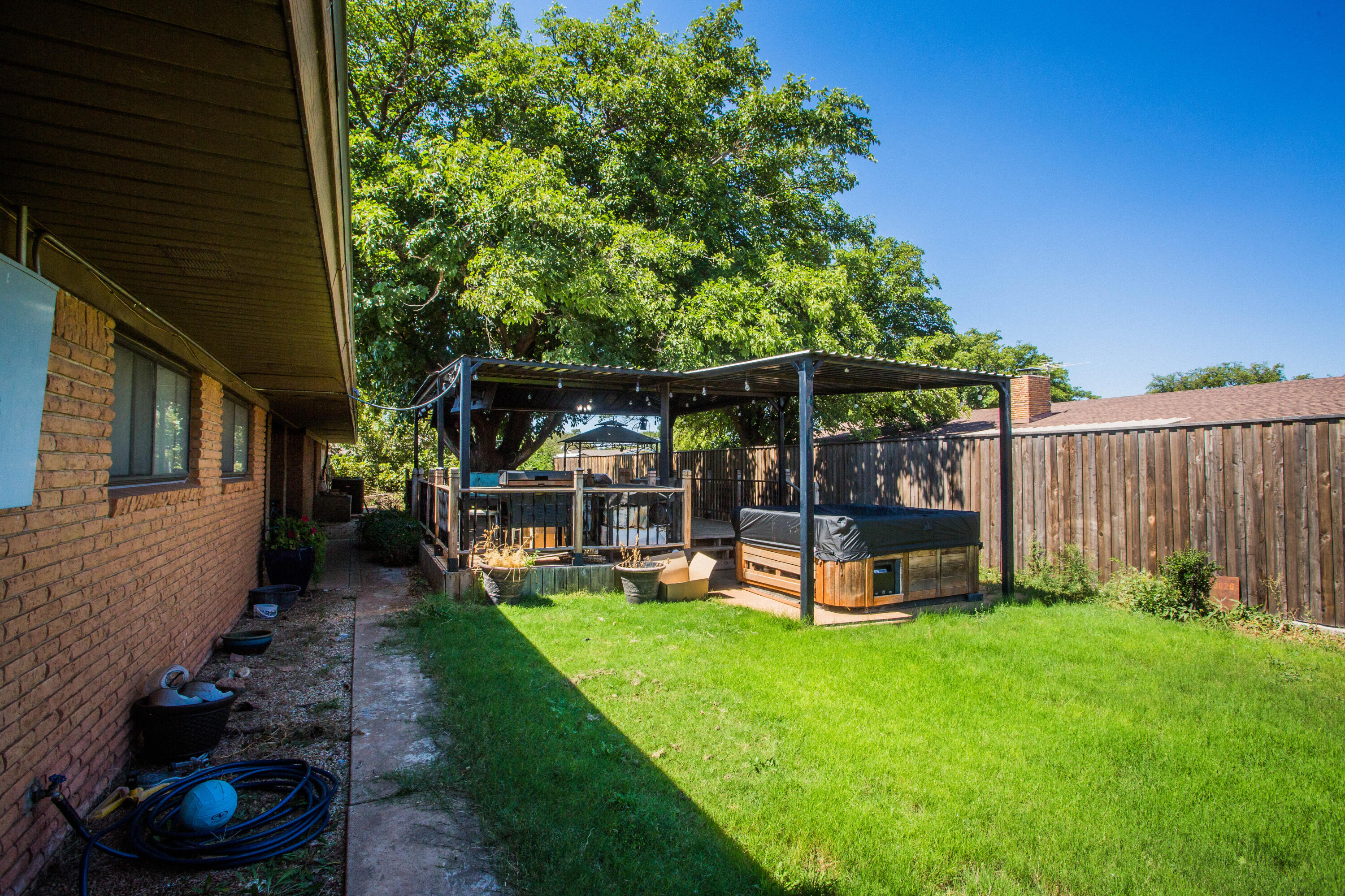 812 1st Street Abernathy, TX 79311 - Photo 53 of 53 a view of a house with backyard sitting area and garden
