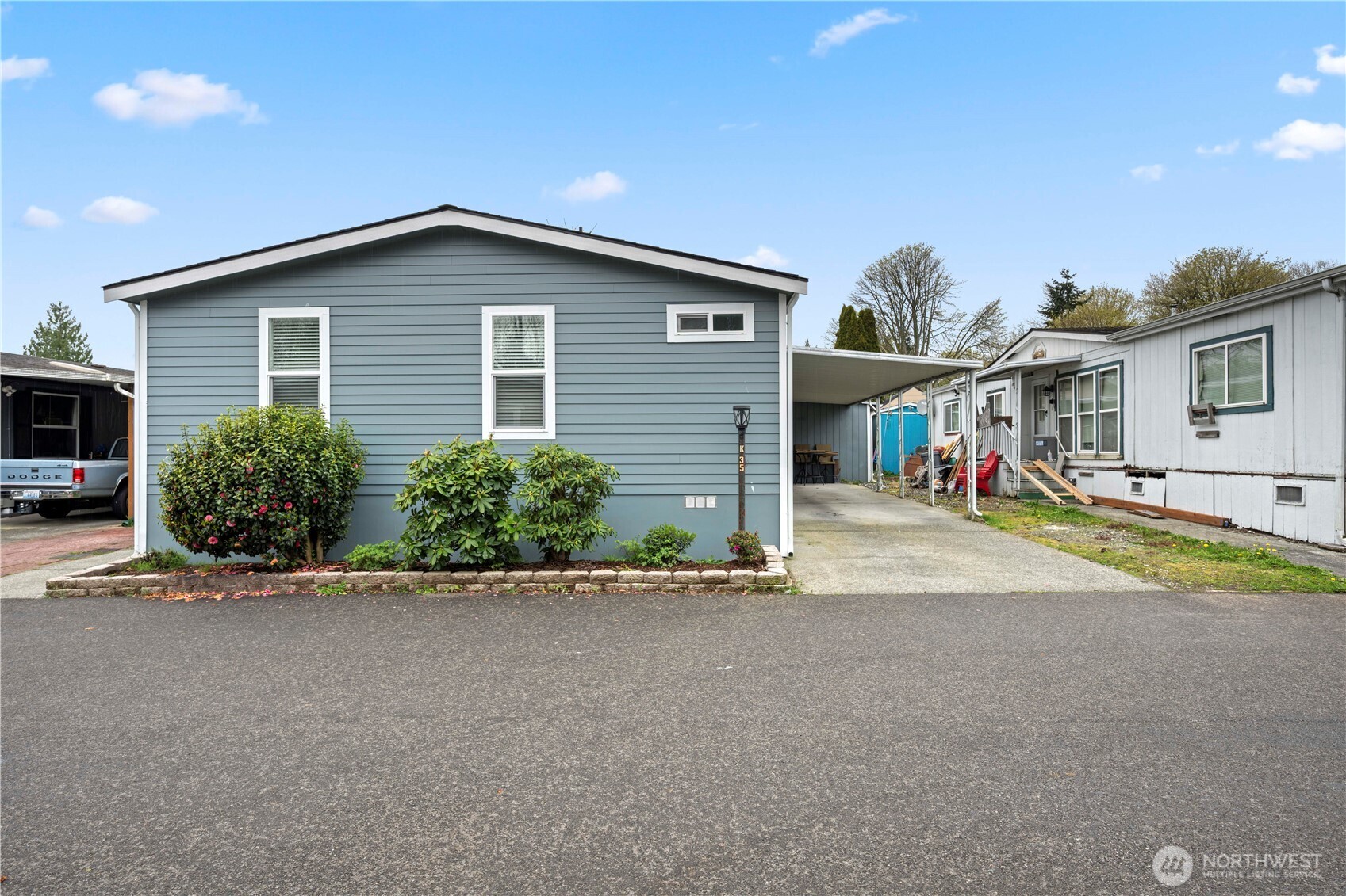 415 Lakeview Road, Unit K35 Lynnwood, WA 98087 - Photo 3 of 27 a view of a house with a street