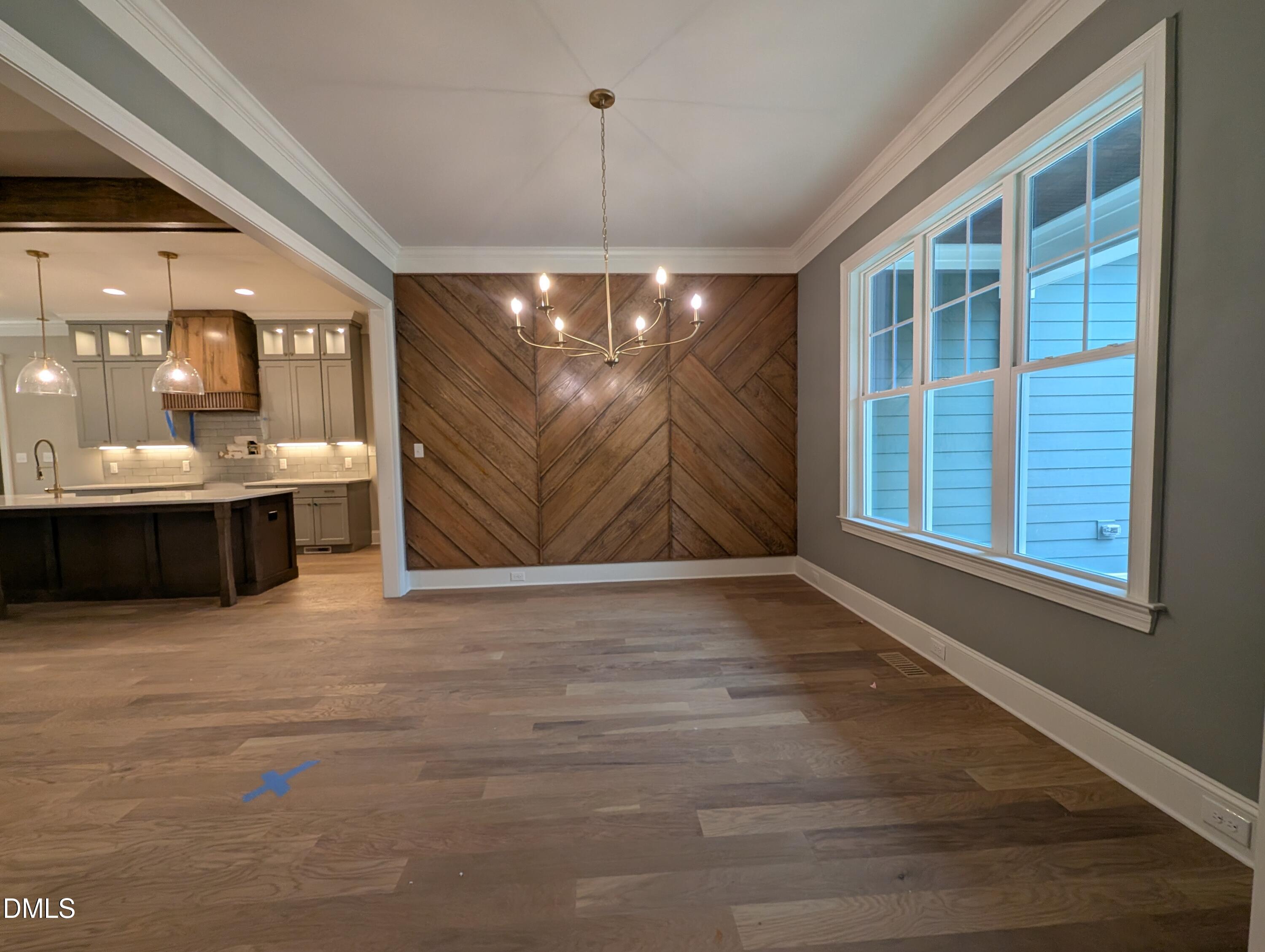 1616 River Bend Lane Raleigh, NC 27610 - Photo 9 of 54 a view of an empty room with a window