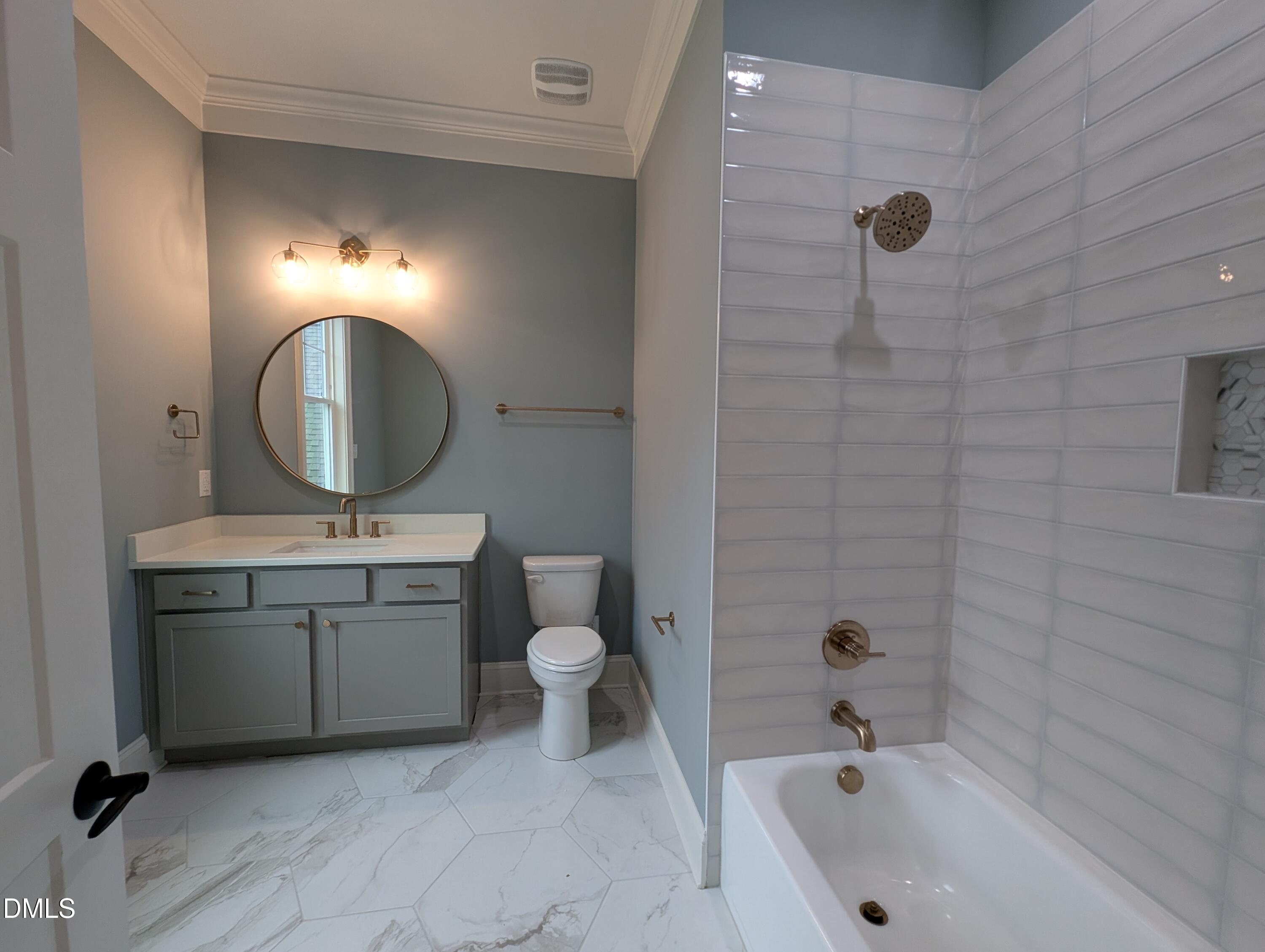1616 River Bend Lane Raleigh, NC 27610 - Photo 43 of 54 a bathroom with a sink mirror vanity and toilet