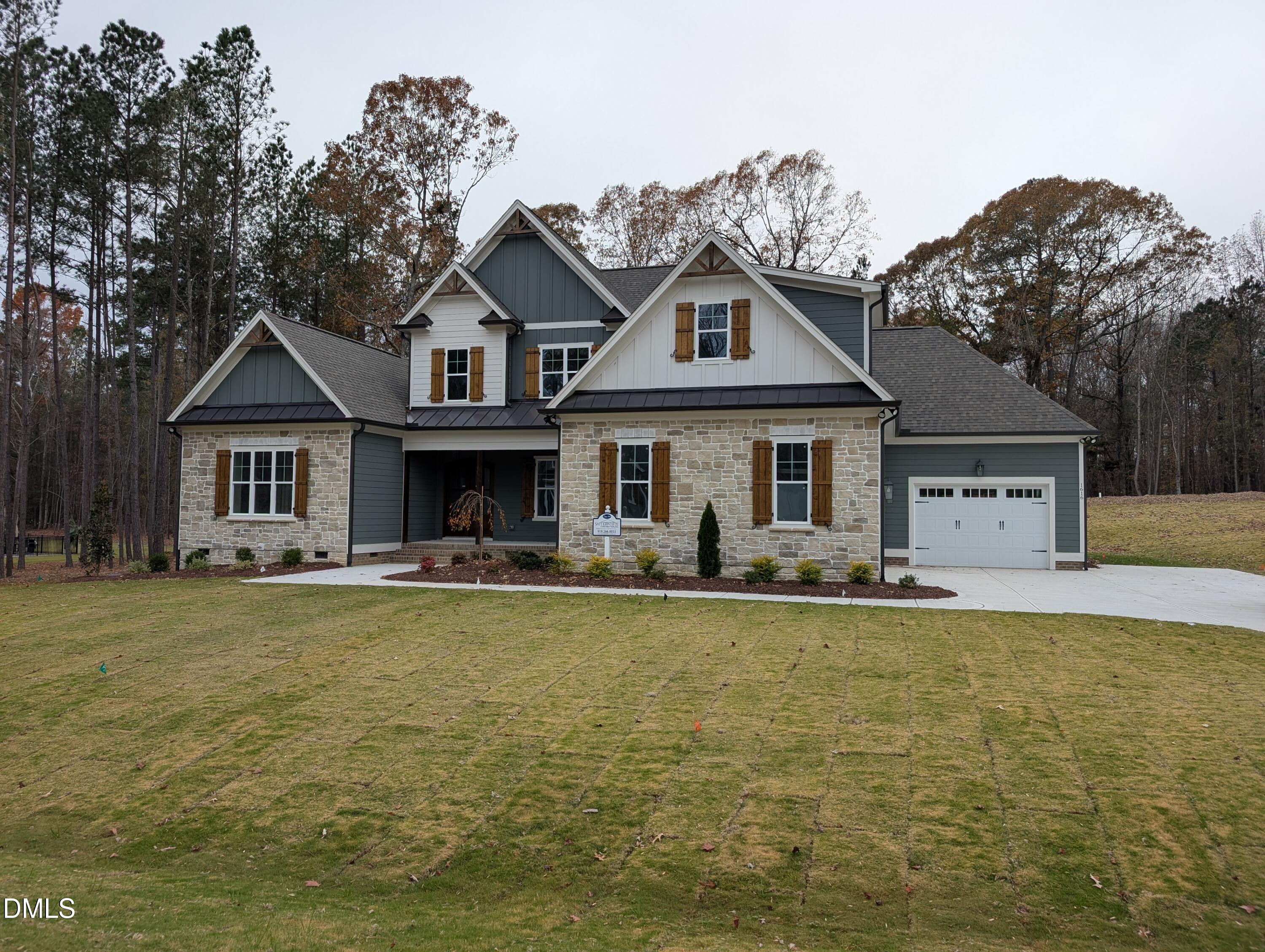 1616 River Bend Lane Raleigh, NC 27610 - Photo 50 of 54 a front view of a house with swimming pool