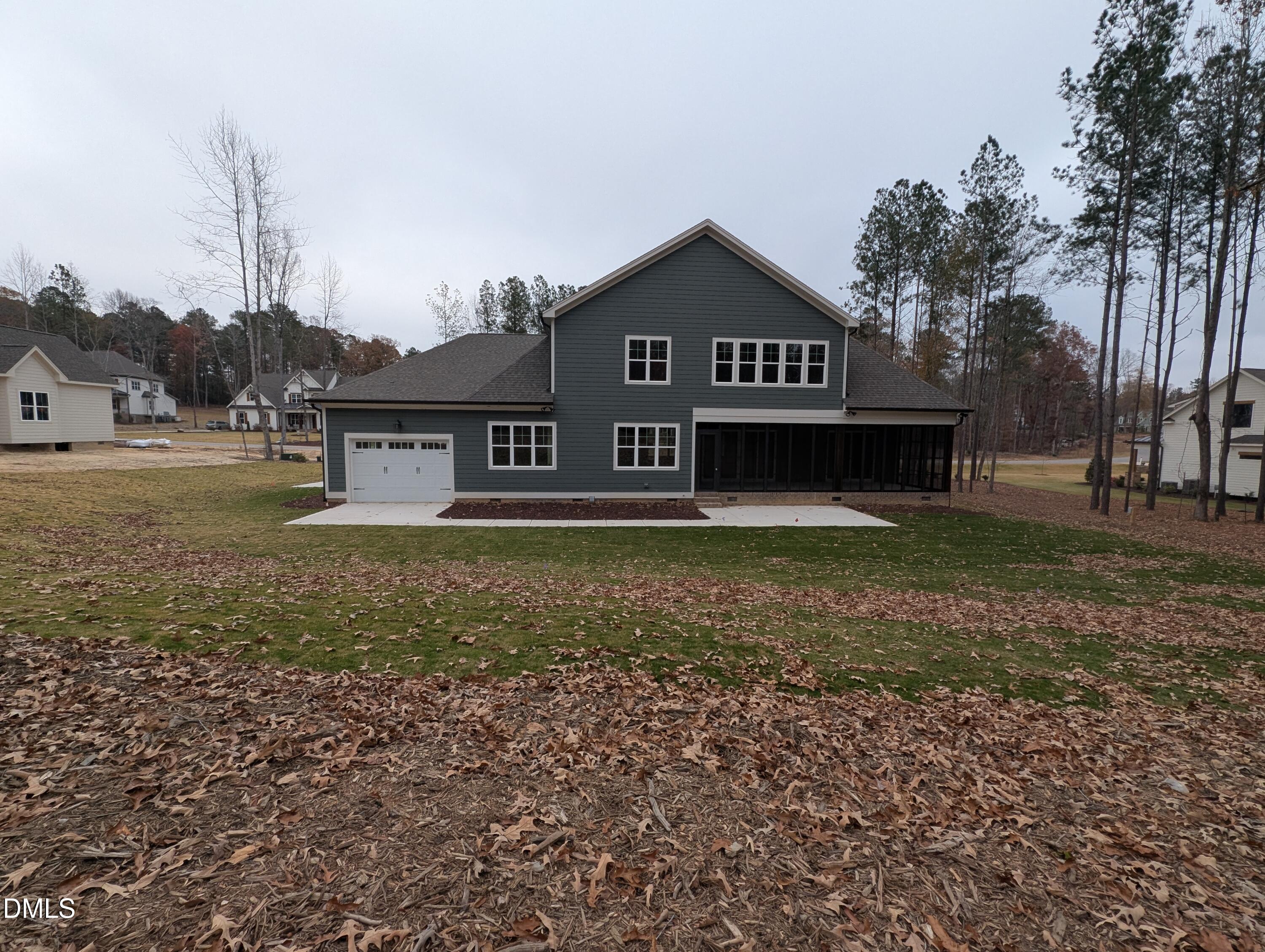 1616 River Bend Lane Raleigh, NC 27610 - Photo 51 of 54 a front view of a house with a yard