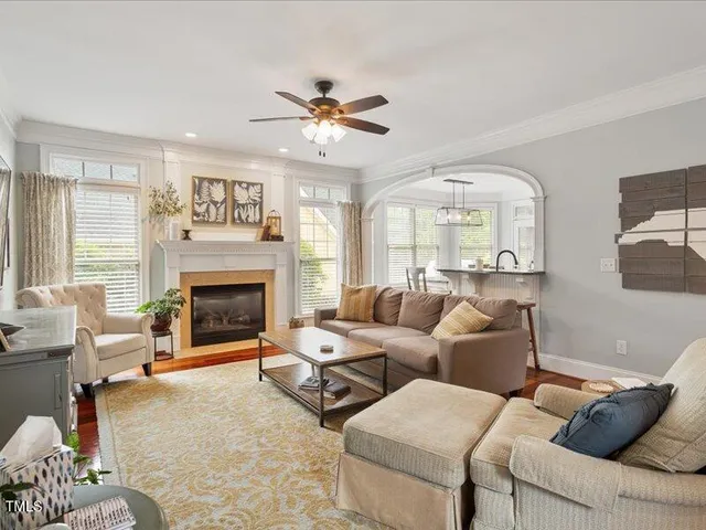 a view of a livingroom with furniture and wooden floor