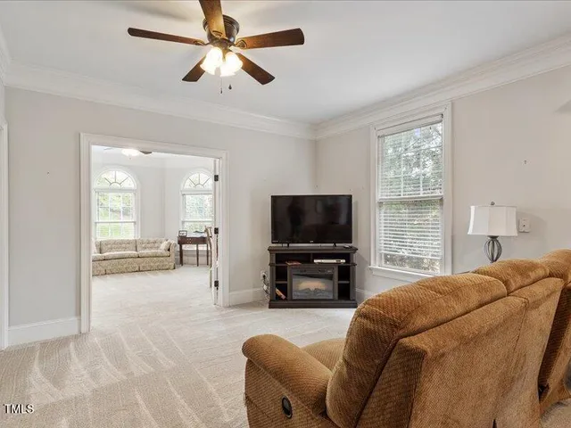 a living room with furniture and a couch