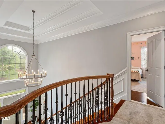 a view of entryway with wooden floor