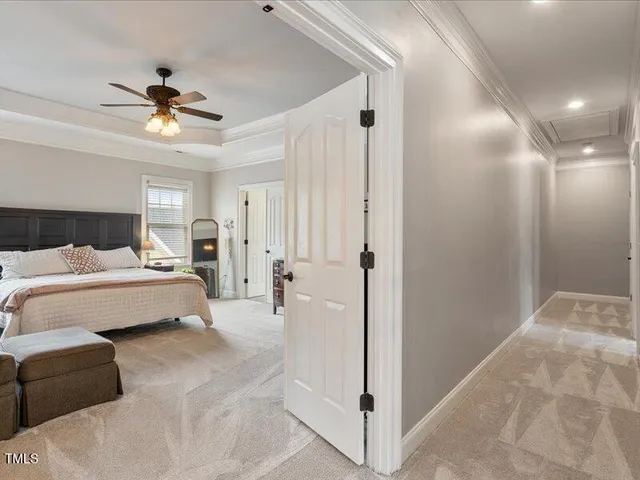 a bedroom with a bed furniture and a window