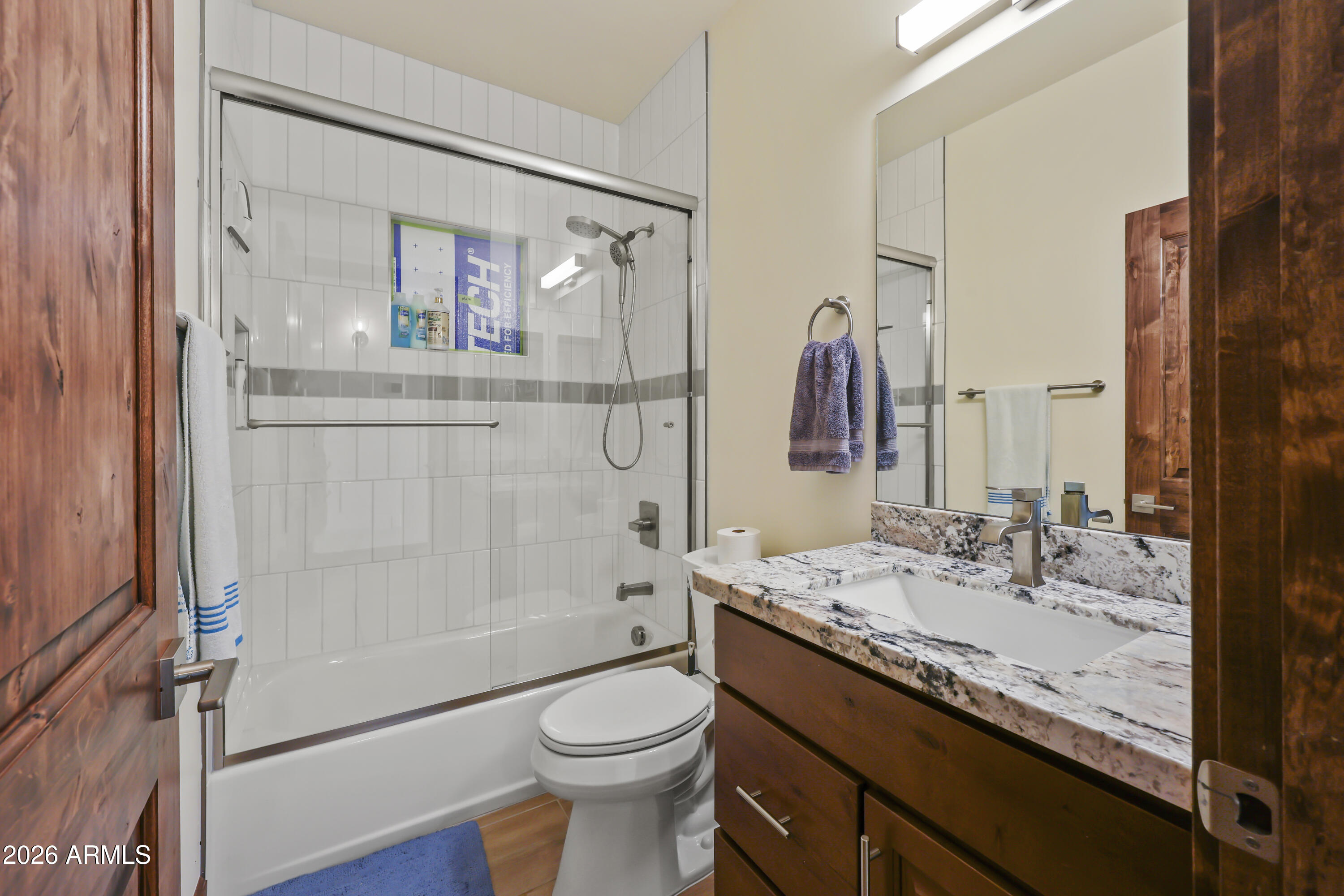49370 West Val Vista Road Maricopa, AZ 85139 - Photo 14 of 58 a bathroom with a granite countertop sink toilet and shower