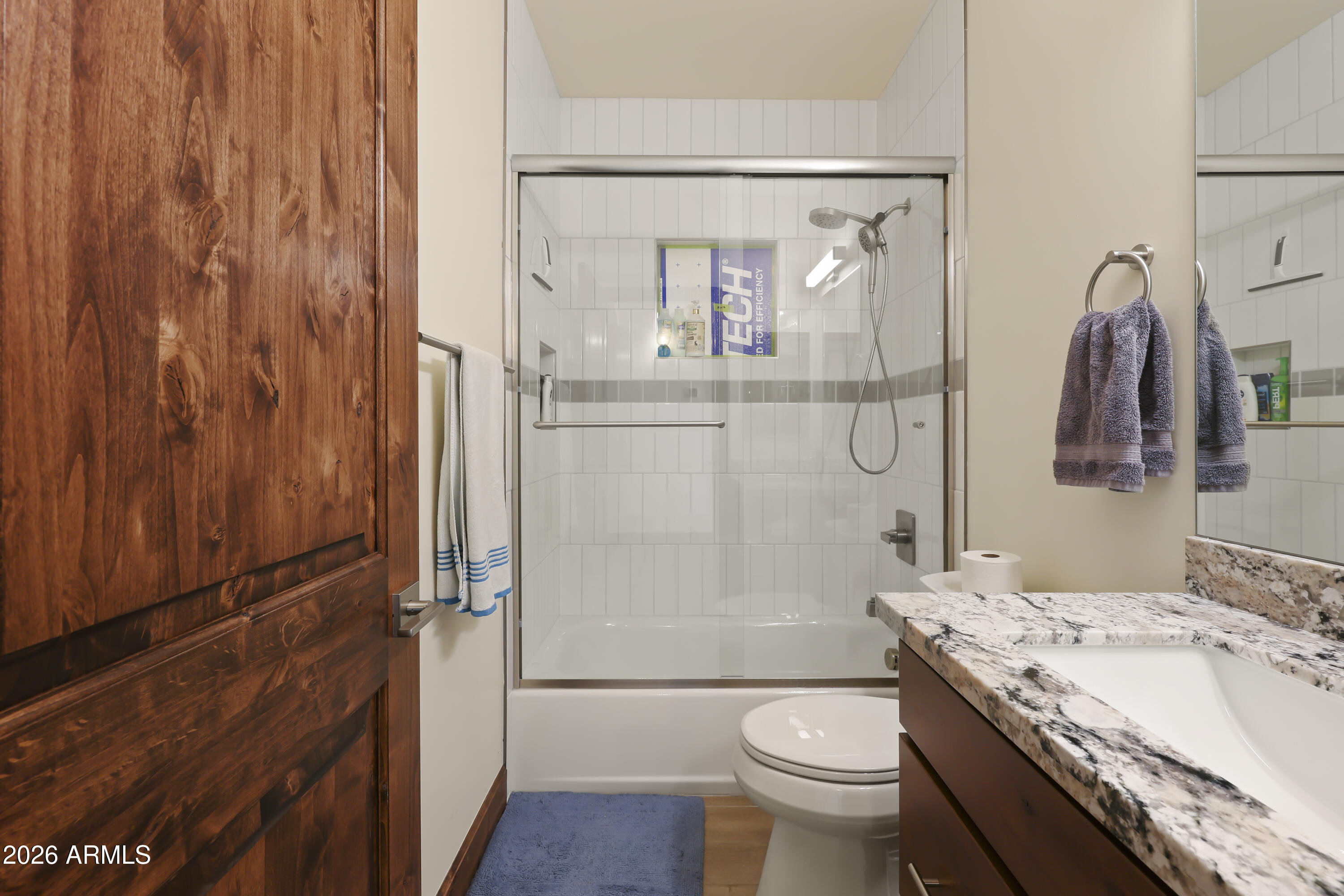 49370 West Val Vista Road Maricopa, AZ 85139 - Photo 15 of 58 a bathroom with a granite countertop sink toilet and shower