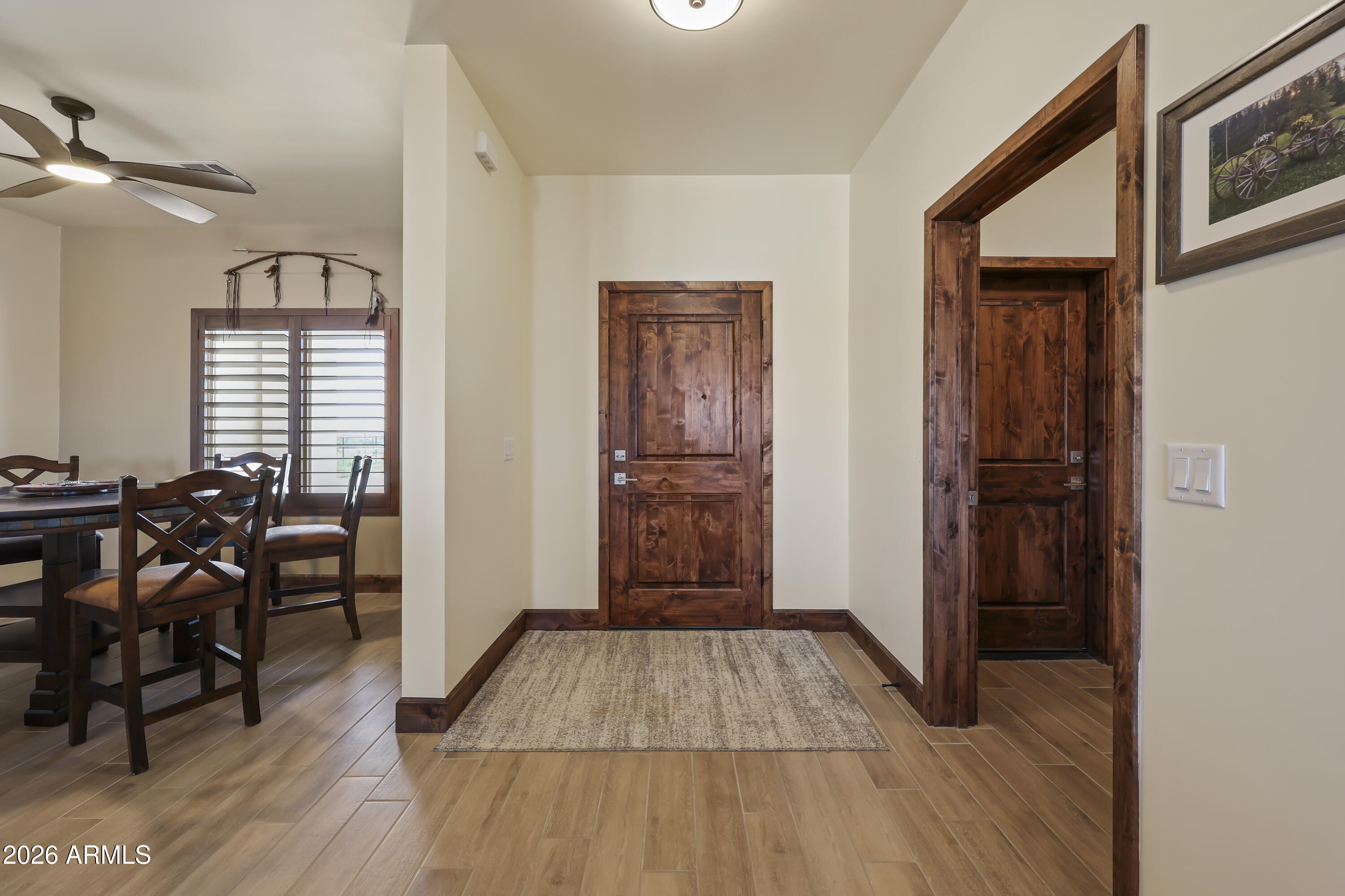 49370 West Val Vista Road Maricopa, AZ 85139 - Photo 21 of 58 a view of a livingroom with furniture and hardwood floor