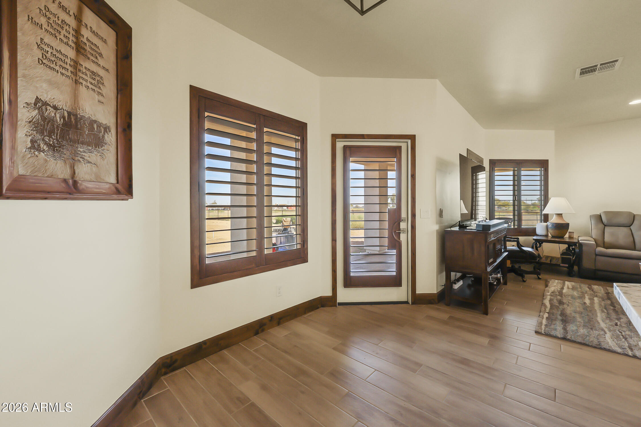 49370 West Val Vista Road Maricopa, AZ 85139 - Photo 22 of 58 a view of a livingroom with workspace and a window