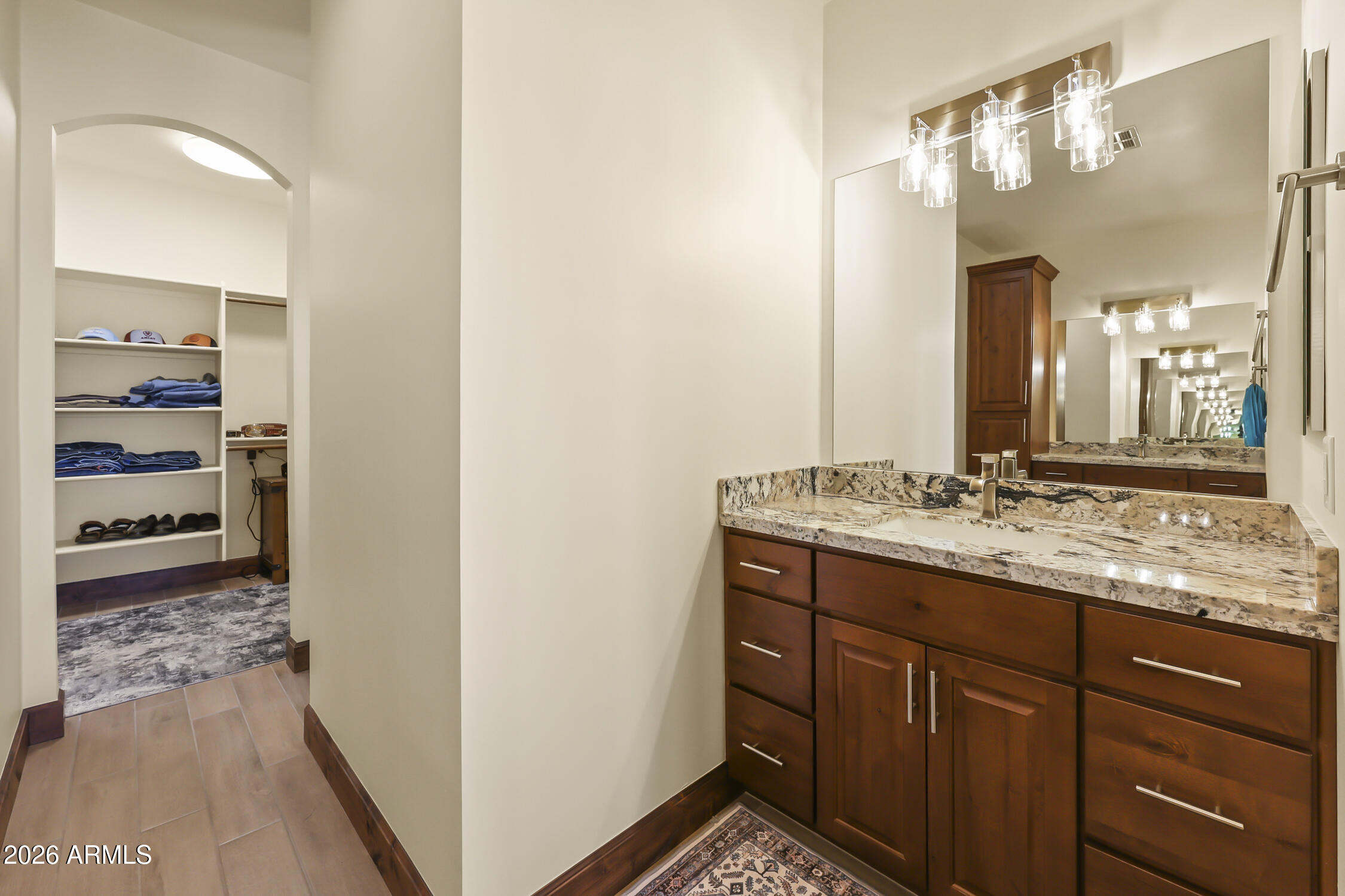 49370 West Val Vista Road Maricopa, AZ 85139 - Photo 26 of 58 a bathroom with a sink and a mirror