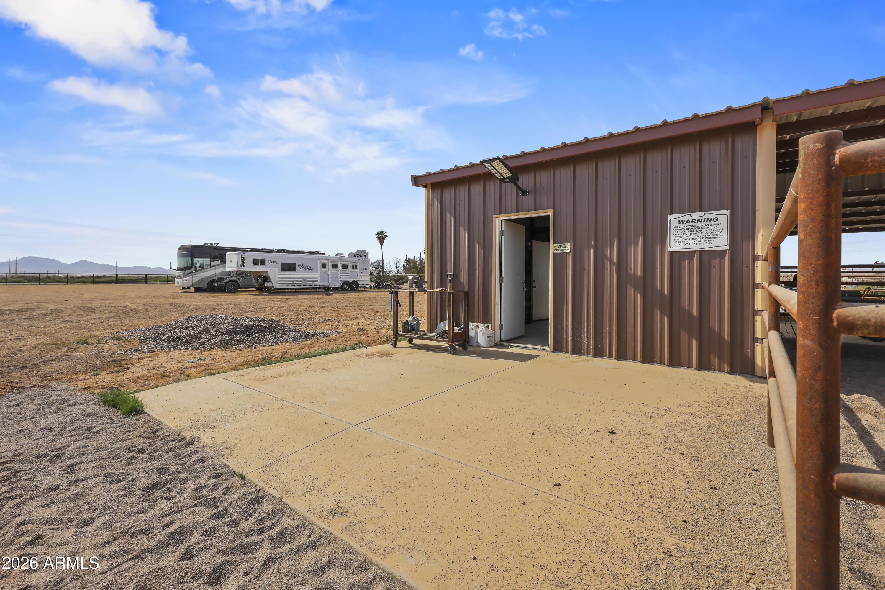 49370 West Val Vista Road Maricopa, AZ 85139 - Photo 34 of 58 a view of a house with backyard and wooden fence