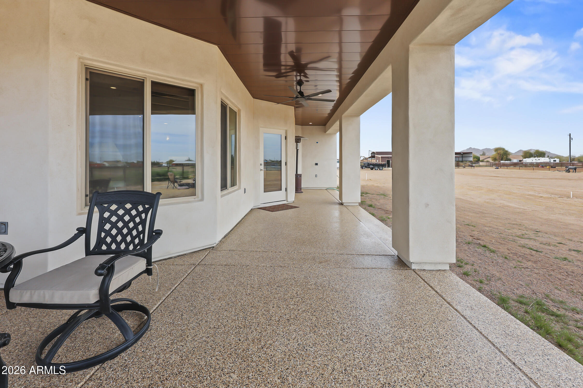 49370 West Val Vista Road Maricopa, AZ 85139 - Photo 47 of 58 a view of a chairs and table in the patio