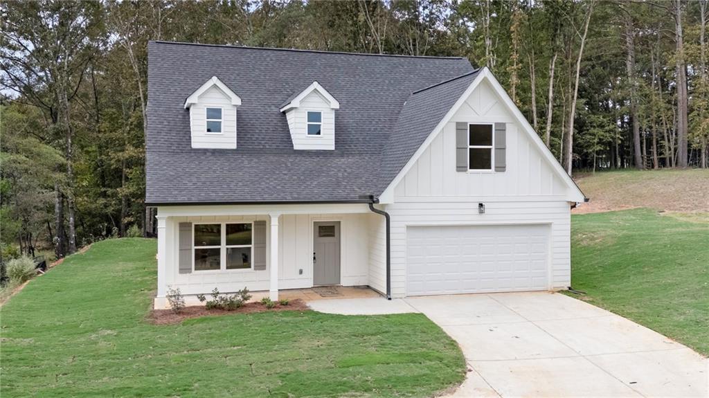 121 Harrison Lane Northeast Calhoun, GA 30701 - Photo 1 of 1 a view of a yard in front view of a house