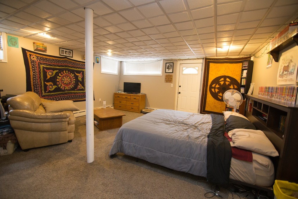 67 Dayton Street Springfield, MA 01118 - Photo 11 of 20 a bedroom with bed and a couch