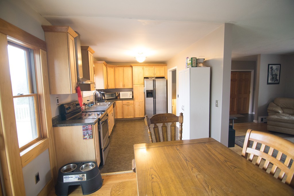 67 Dayton Street Springfield, MA 01118 - Photo 3 of 20 a dining room with furniture window and wooden floor