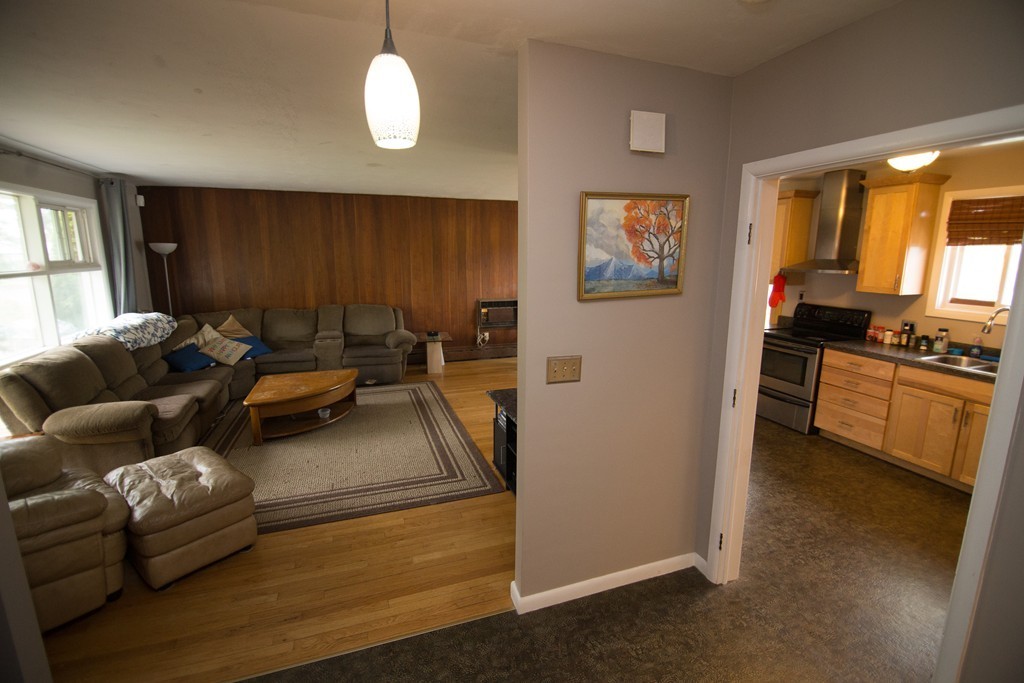 67 Dayton Street Springfield, MA 01118 - Photo 5 of 20 a living room with furniture and a window