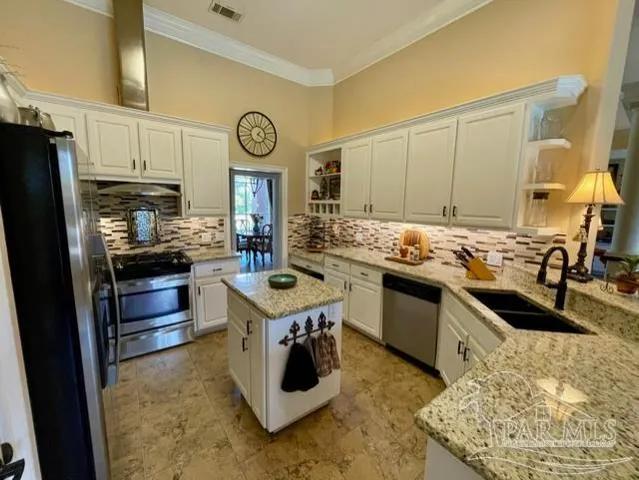 a view of a livingroom with furniture and a couch