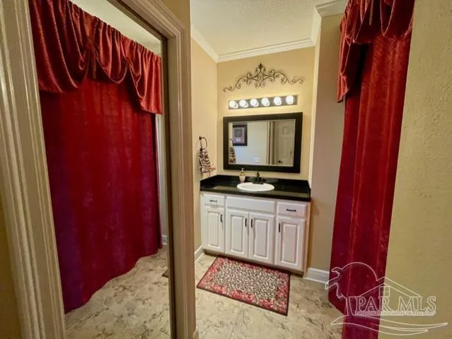 a bed room with a bed furniture and a window