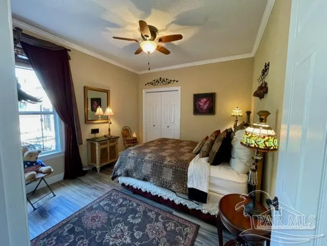 a view of a backyard with table and chairs