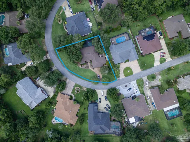 an aerial view of a city with lots of residential buildings