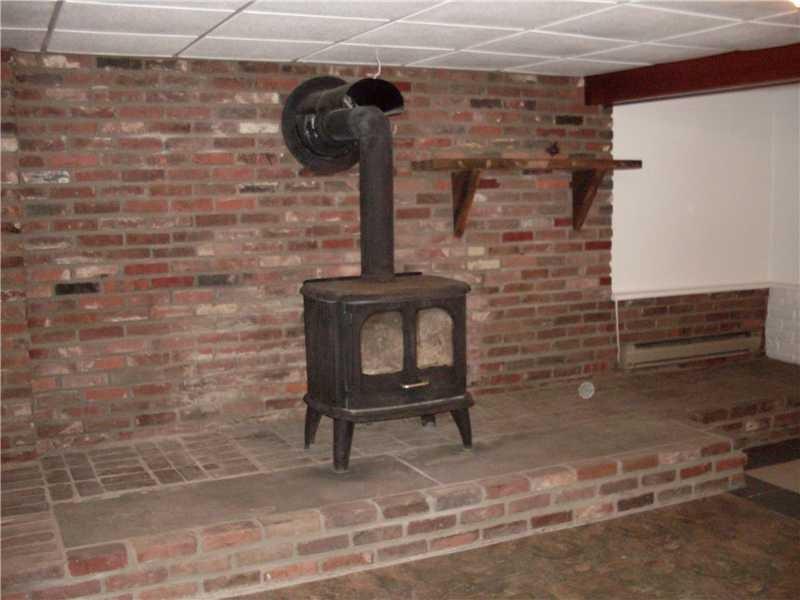 1420 Reissing Road McDonald, PA 15057 - Photo 14 of 25 WOOD BURNER IN LOWER LEVEL