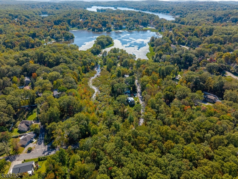 7 Bridge Road Vernon, NJ 07422 - Photo 5 of 18 an aerial view of residential houses with outdoor space and trees