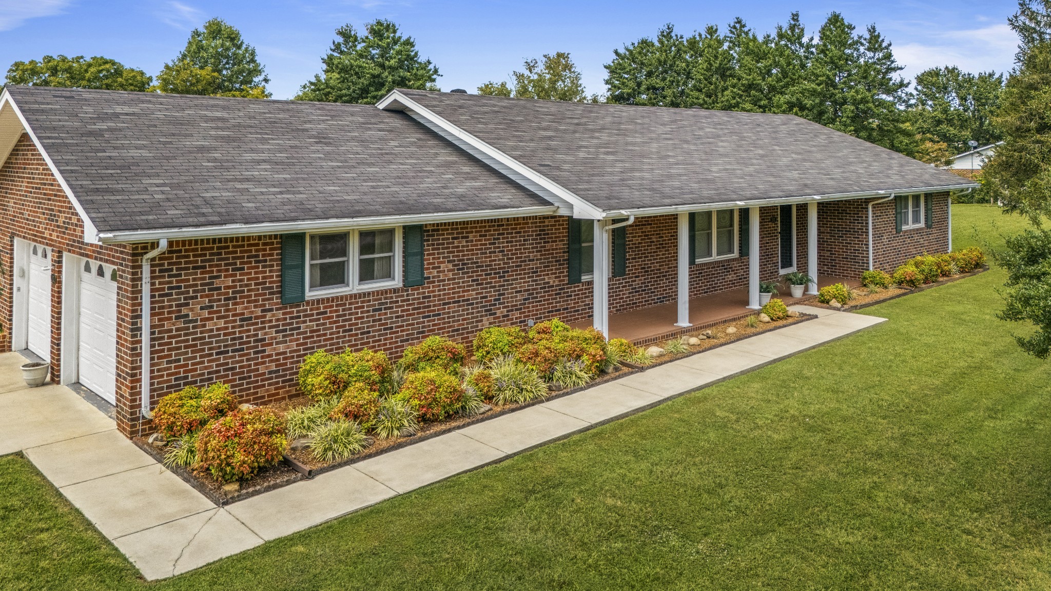 front view of a house with a yard