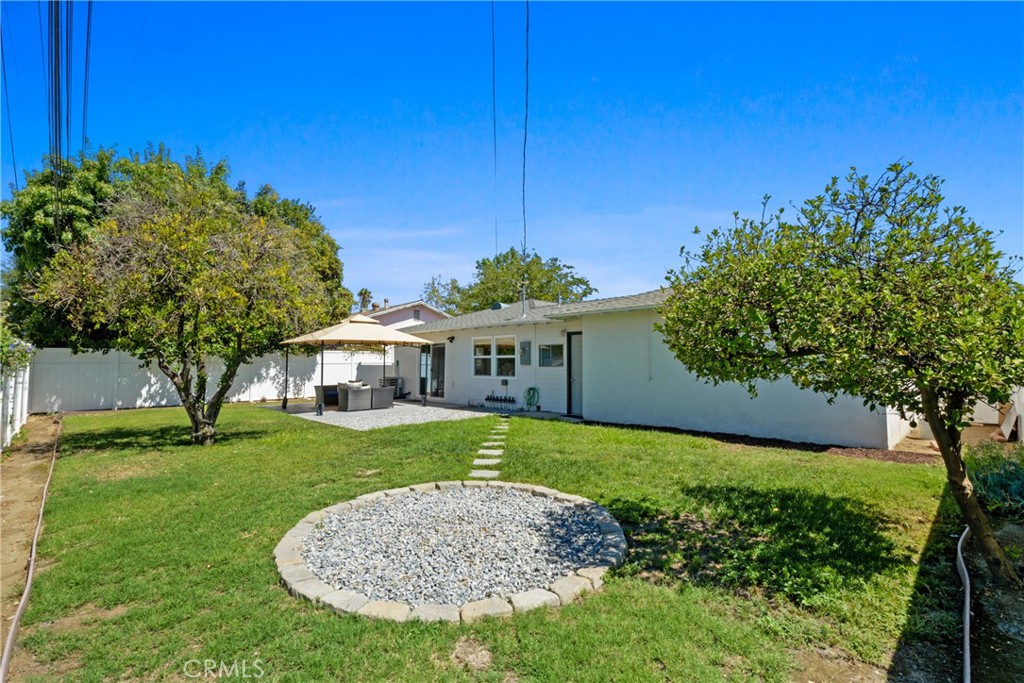 2463 Valhalla Street Pomona, CA 91767 - Photo 14 of 18 a front view of a house with garden