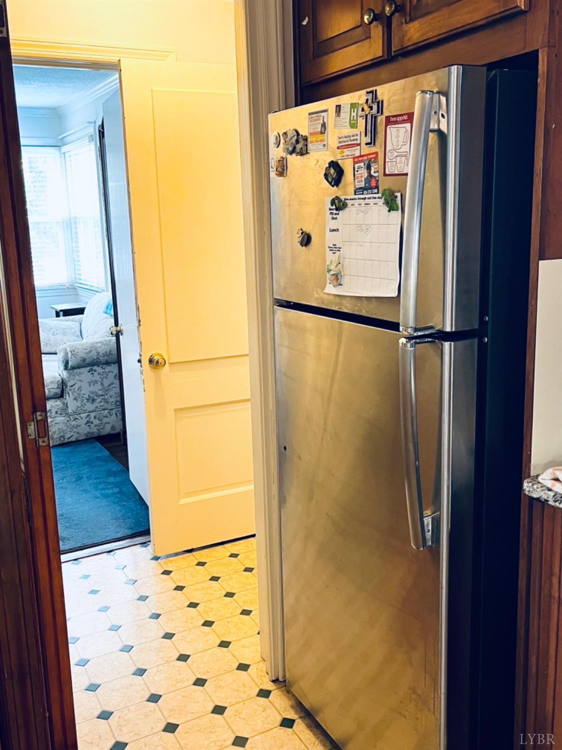 265 Fairview Road Chatham, VA 24531 - Photo 67 of 88 a white refrigerator freezer and a black umbrella